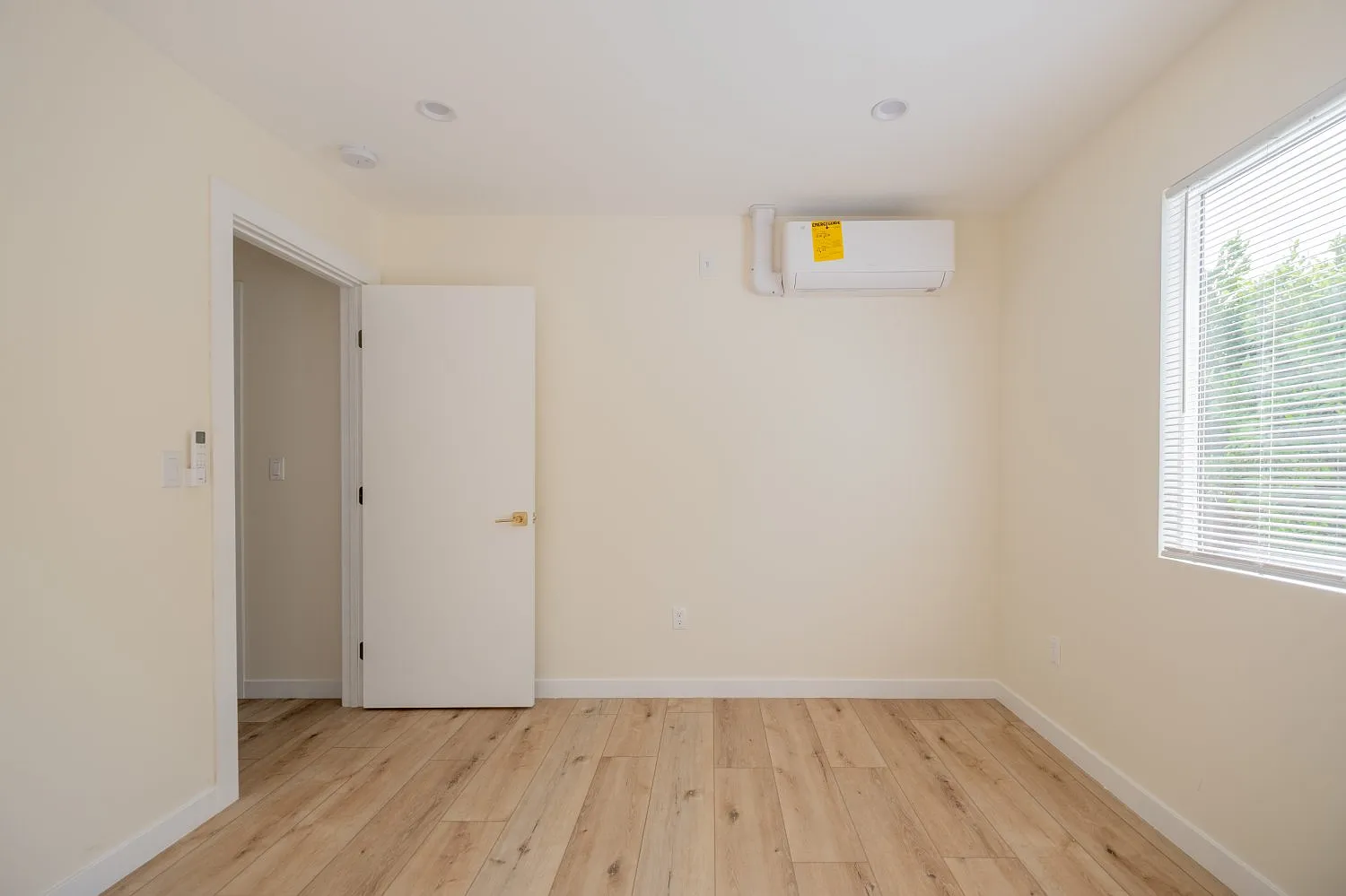 ADU bedroom with natural light and premium finishes